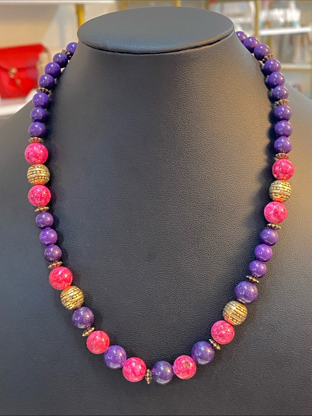 Purple and pink glass or ceramic necklace